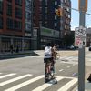 Activists Post Signs Encouraging Cyclists To Ignore Red Lights